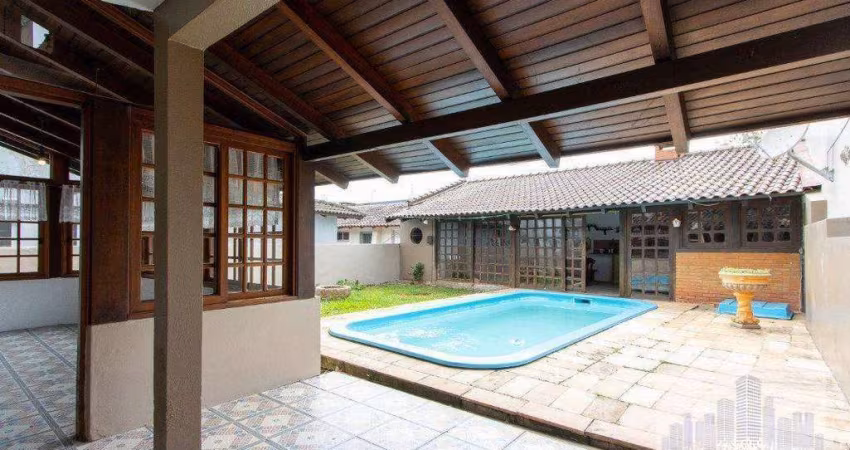 Casa com 4 dormitórios para alugar, 257 m² por R$ 7.400,00/mês - Guarujá - Porto Alegre/RS