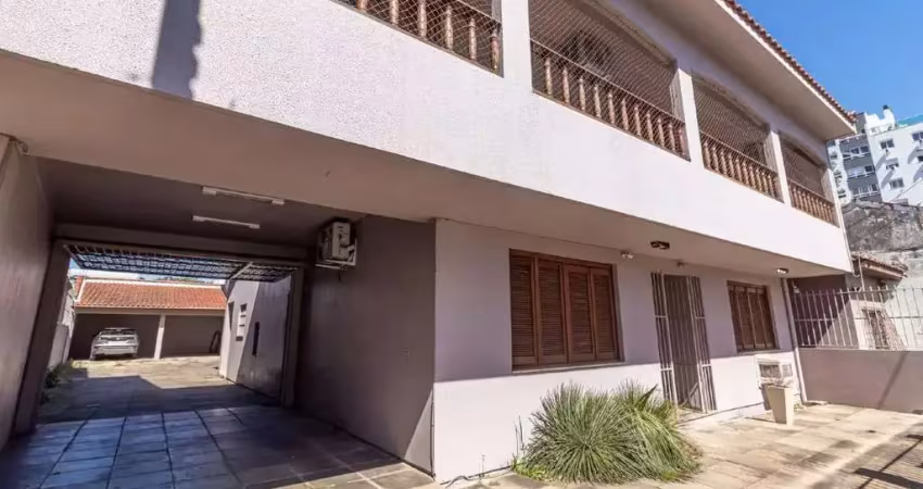 Casa 4 dormitórios, 2 suítes para locação no bairro medianeira, porto alegre/rs.