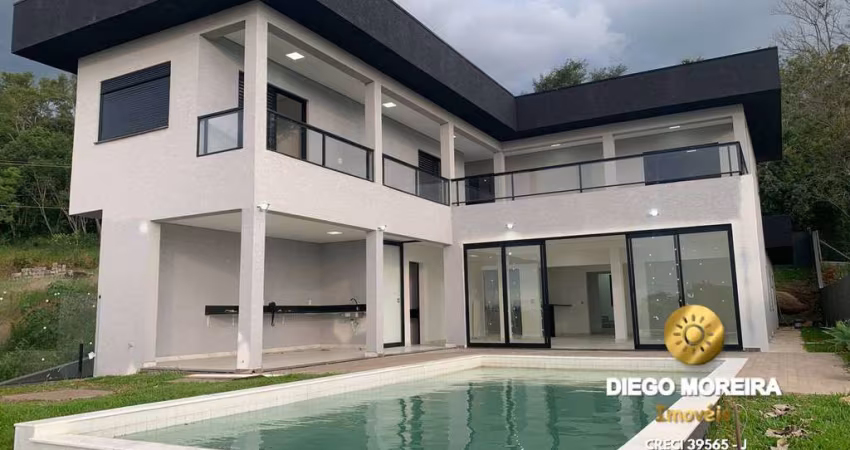 Casa Exclusiva em Loteamento com Vista Deslumbrante!