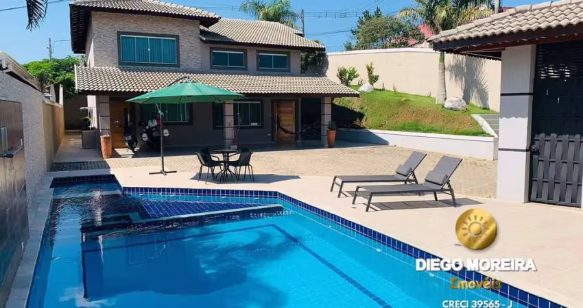Casa á venda em Terra Preta com 3 dormitórios, suíte com hidromassagem.