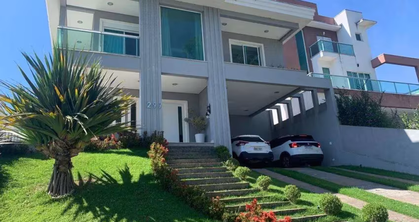 Casa com 4 suítes à venda com espaçosa área Gourmet com piscina em condomínio clube