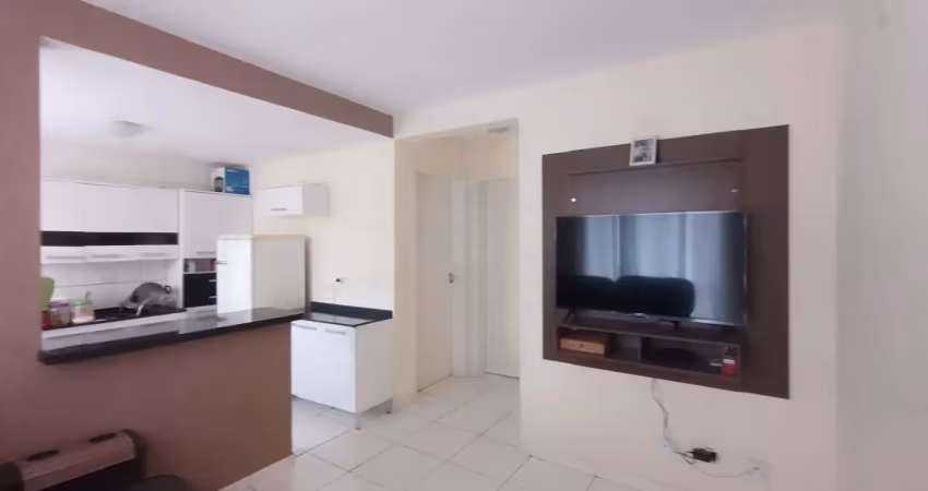 Apartamento com 2 dormitórios e sacada com churrasqueira.