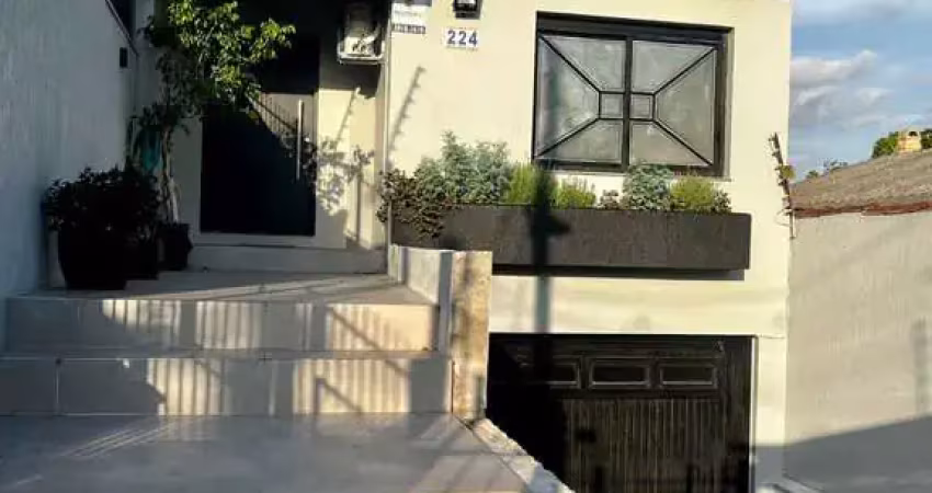Casa com 4 quartos à venda na Rua Victor Silva, 224, Camaquã, Porto Alegre