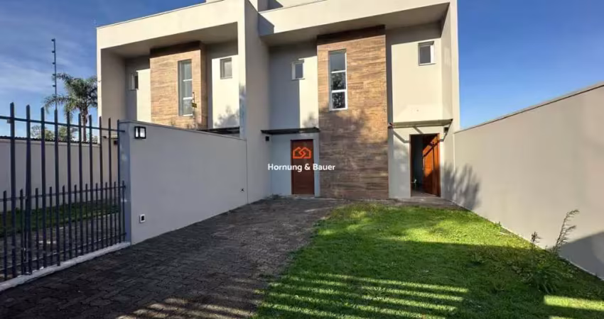 Sobrado no bairro união com pátio amplo nos fundos.