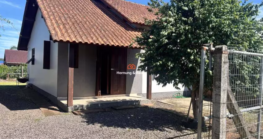 Casa plana à venda no bairro lago azul em estância velha.