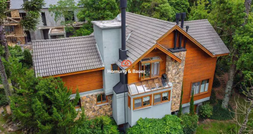 Uma residência incrível lhe aguarda! casa à venda no aspen mountain, gramado!