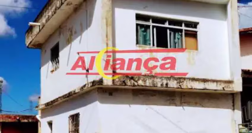 Terreno com 3 casas
