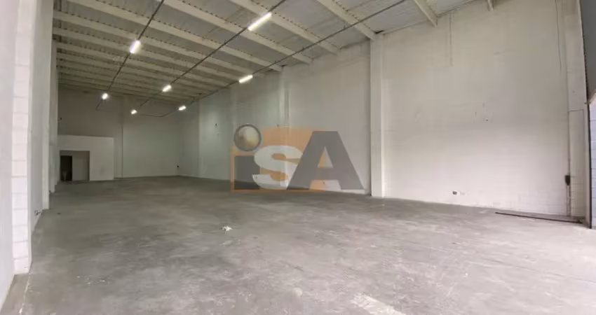 Galpão comercial, na descida do viaduto, no bairro de calmon viana em poá/sp.