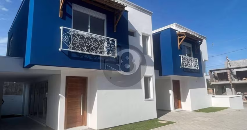 Charmosa Casa com 3 Dormitórios!