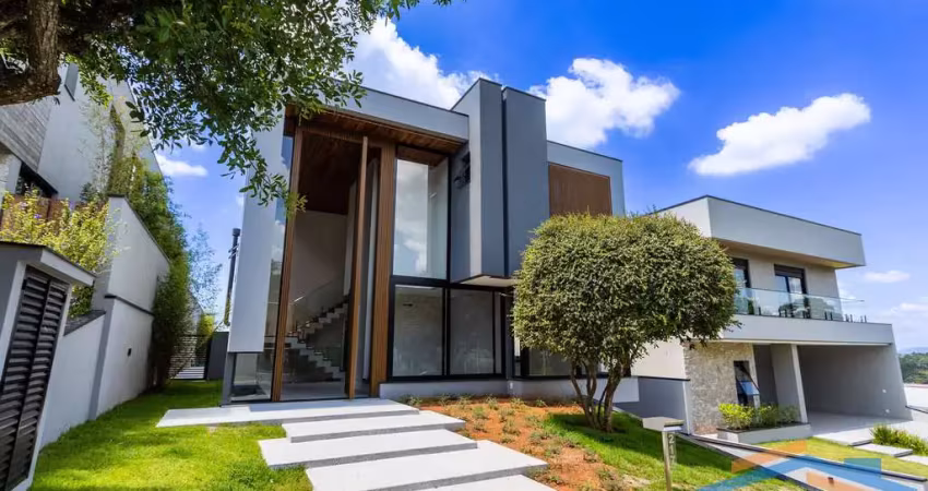 Casa em condomínio 550m² com 4 suítes no genesis ii.