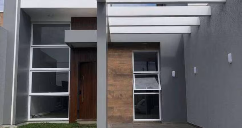 G1024 - Belíssimo geminado em ótima localização no Centro de Imbé