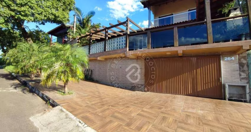 Casa com 4 dormitórios para alugar, 350 m² por R$ 5.070,00/mês - Camboim - Sapucaia do Sul/RS