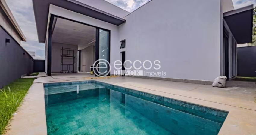 Casa em condomínio à venda, 3 quartos, 3 suítes, 4 vagas, Laranjeiras - Uberlândia/MG