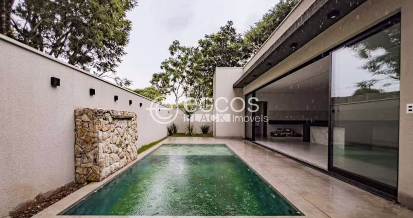 Casa em condomínio à venda, 4 quartos, 3 suítes, 2 vagas, Laranjeiras - Uberlândia/MG