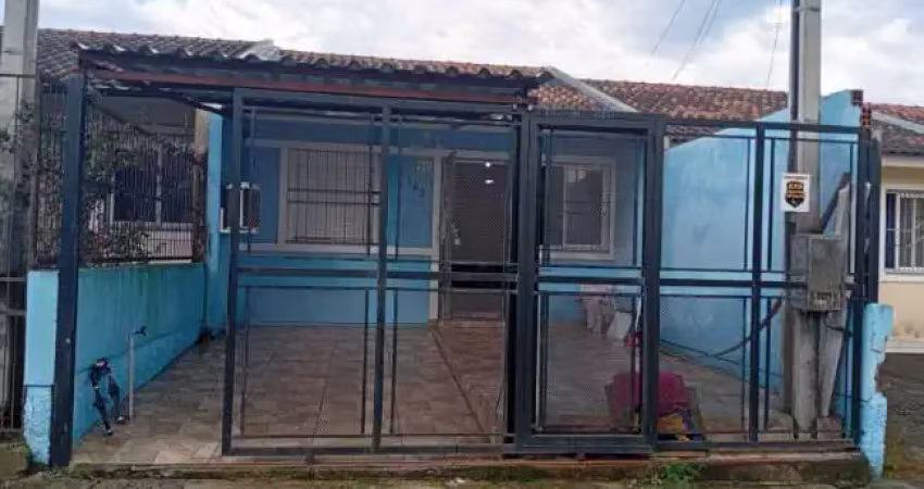 Casa com 2 quartos à venda na Ipê Mirim, 142, Chácara das Rosas, Cachoeirinha