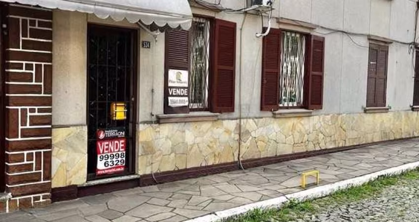 Vende-se apto térreo, com 03 dormitórios, sala com 02 ambientes