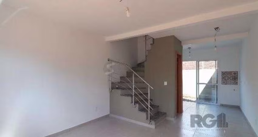 Casa Condominio em Porto Alegre, no bairro Vila Nova, com 2 dormitório(s), e 2 banheiros, à venda.