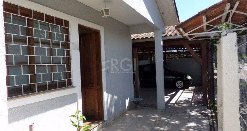 Casa na Hípica com 3 dormitórios e 2 vagas