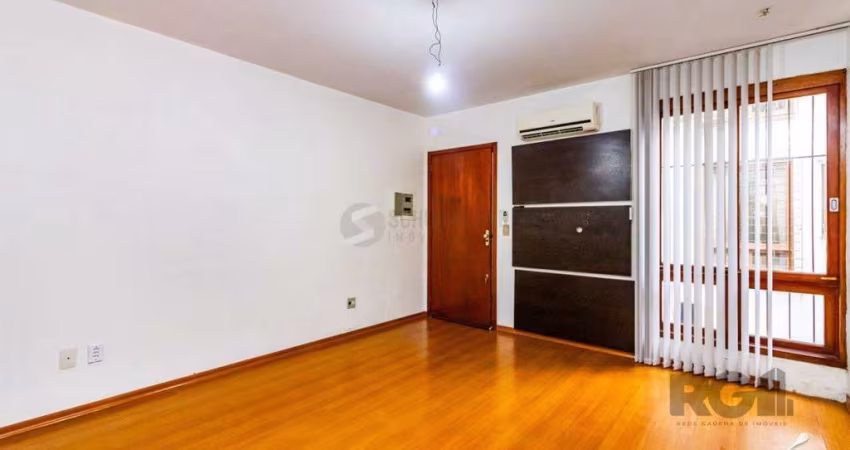 Apartamento com 2 dormitórios e 1 vaga de garagem escriturada no bairro Rio Branco