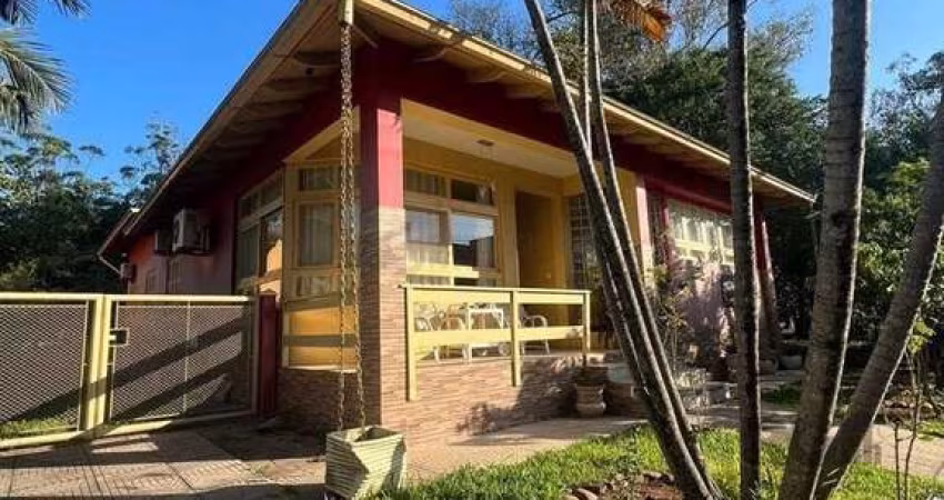 Casa com 4 quartos, suíte, churrasqueira, vaga de garagem, no bairro Elsa, Viamão/RS