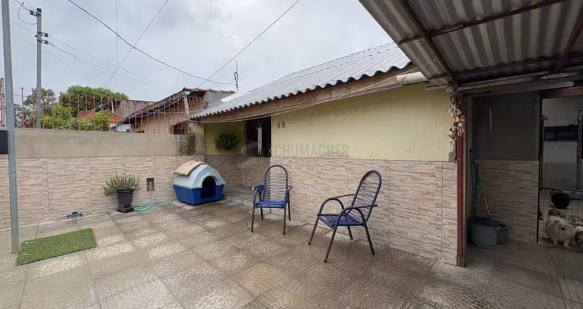 Casa no bairro Restinga - 3 dormitórios