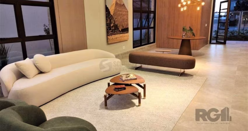 Lindo apartamento 2 dormitórios com 2 suítes, lavabo, vaga de garagem, amplo living 2 ambientes e cozinha com churrasqueira.