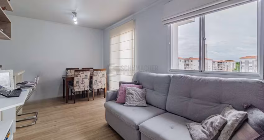 Apartamento com 2 dormitórios e 1 vaga de garagem escriturada no Bairro Humaitá