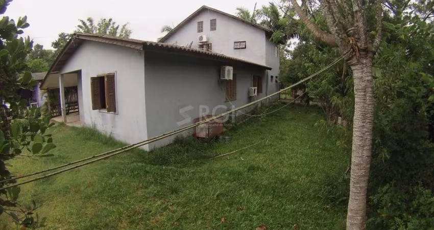 Casa 5 dormitórios no bairro Ponta Grossa