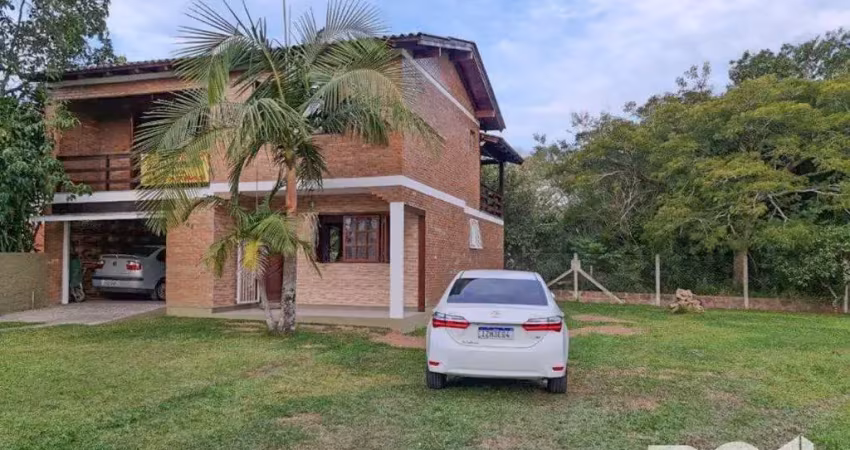 Casa com 2 quartos à venda na Beco da Vitória, 364, Boa Vista do Sul, Porto Alegre