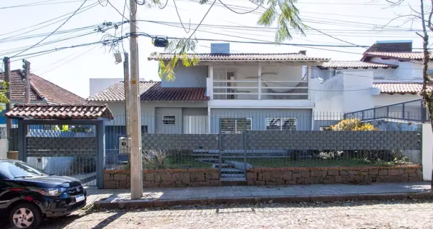 Casa 3 dormitórios no bairro tristeza com 2 vagas de garagem
