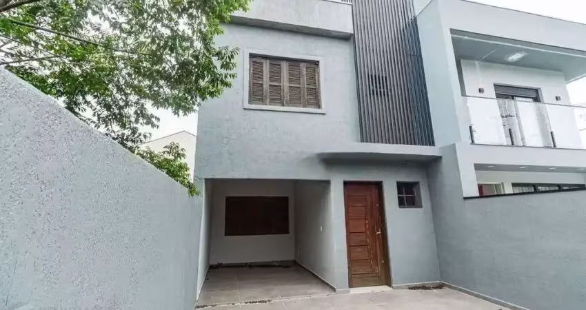 Casa com 3 quartos à venda na Rua Ronaldo Molina de Quadros, 477, Mário Quintana, Porto Alegre