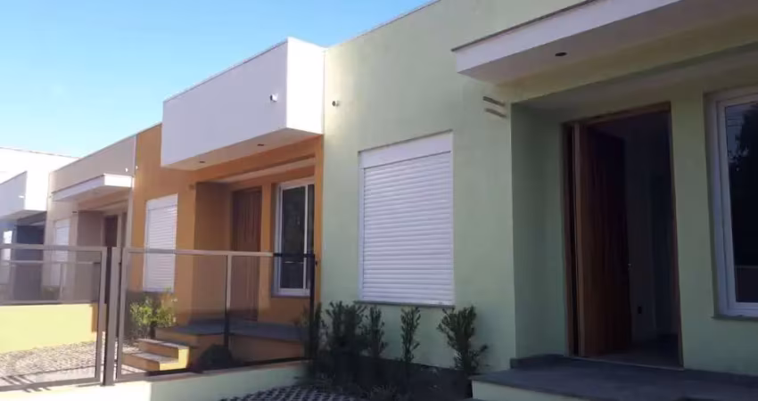 Casa com 3 quartos à venda na Rua Criciúma, 102, Guarujá, Porto Alegre