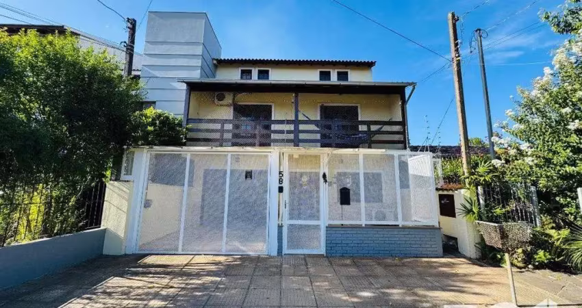 Casa com 4 quartos à venda na Rua Hermínio Bittencourt, 58, Hípica, Porto Alegre