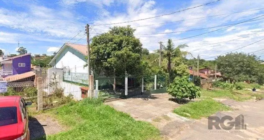 Casa com 3 quartos à venda na Rua Ênio de Souza, 226, Vila Nova, Porto Alegre
