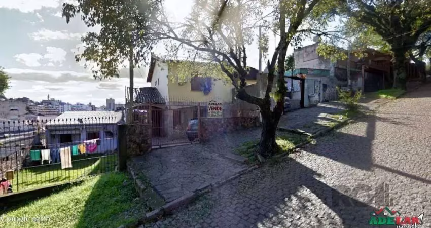 Casa com 3 quartos à venda na Avenida Teresina, 249, Medianeira, Porto Alegre