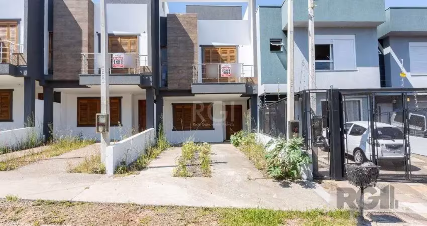 Casa com 3 quartos à venda na Rua Manoel Fernandes, 78, Guarujá, Porto Alegre