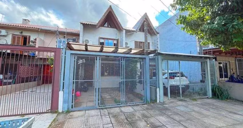 Casa com 2 quartos à venda na Rua Itacyr Rossi, 233, Guarujá, Porto Alegre