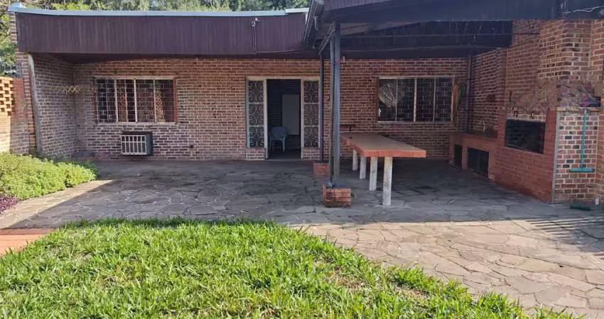 Casa com 3 quartos à venda na Rua Rodolfo Breyer, 67, Belém Novo, Porto Alegre