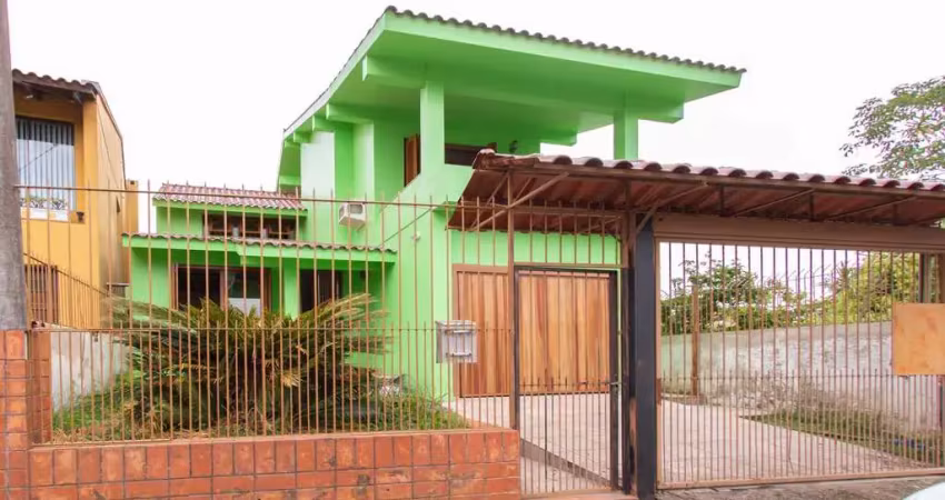 Casa com 3 quartos à venda na Rua Augusto de Lourenço Martins, 110, Vila Nova, Porto Alegre