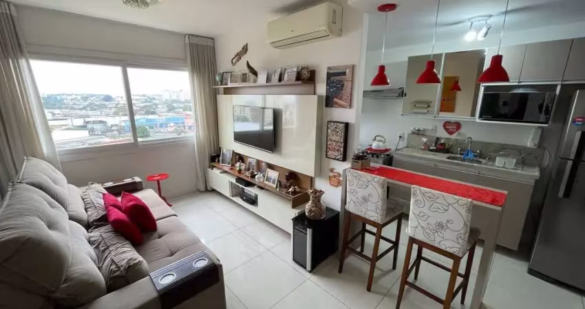 Apartamento de 2 dormitórios, suíte, churrasqueira e 2 vagas.