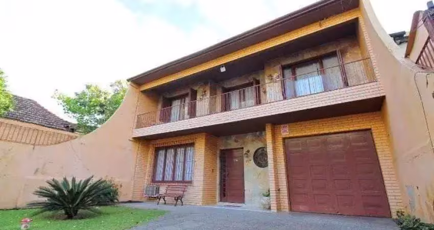 Casa com 3 quartos à venda na Avenida João Wallig, 119, Passo da Areia, Porto Alegre