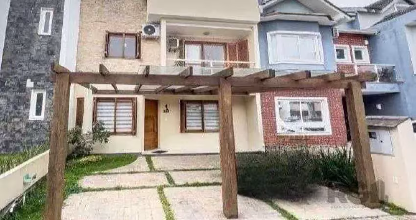 Casa em condomínio fechado com 3 quartos à venda na Rua Carlos Maximiliano Fayet, 80, Hípica, Porto Alegre