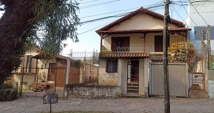 Casa com 3 quartos à venda na Avenida Doutor Petrônio Portella, 1415, Parque Santa Fé, Porto Alegre