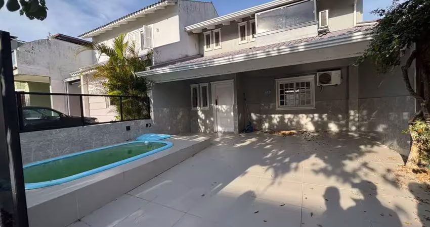 Casa com 3 quartos à venda na Rua Guatambu, 218, Hípica, Porto Alegre