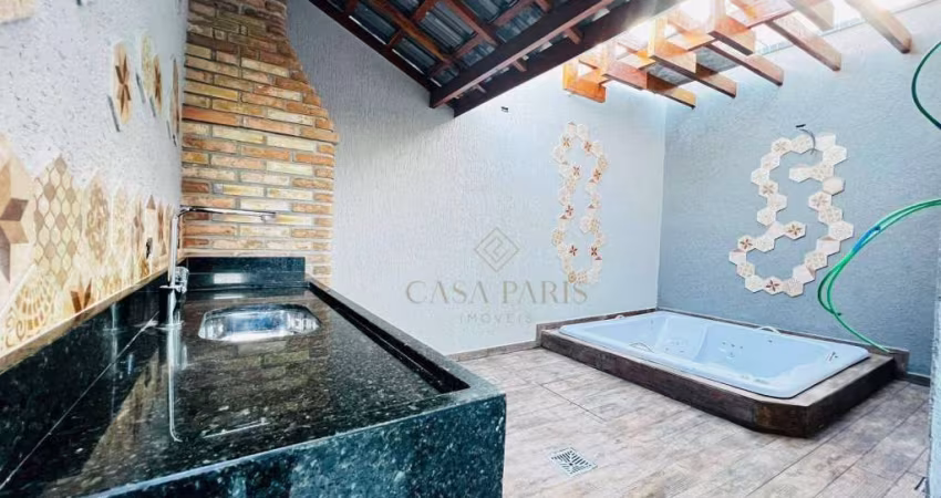 Casa com 3 dormitórios à venda, 115 m² por R$ 830.000,00 - Caiçara - Praia Grande/SP