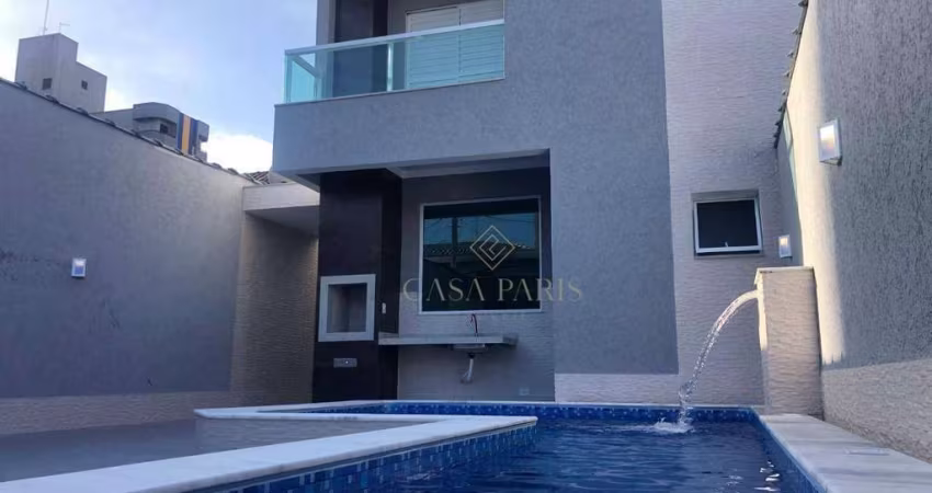 Sobrado com 3 dormitórios à venda, 135 m² por R$ 990.000,00 - Tupi - Praia Grande/SP