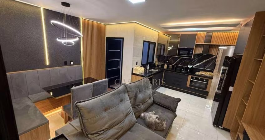 Casa com 3 dormitórios à venda, 110 m² por R$ 930.000,00 - Vila Tupi - Praia Grande/SP