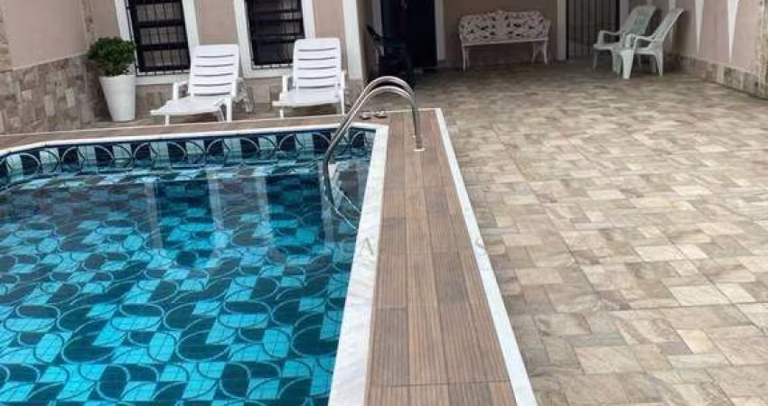 Casa com 3 dormitórios à venda, 159 m² por R$ 850.000 - Vila Caiçara - Praia Grande/SP