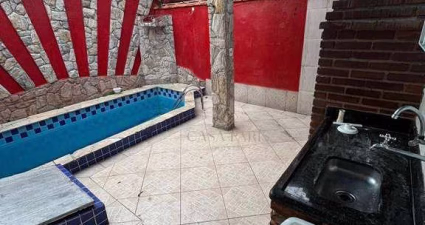 Casa com 3 dormitórios à venda, 165 m² por R$ 615.000,00 - Caiçara - Praia Grande/SP