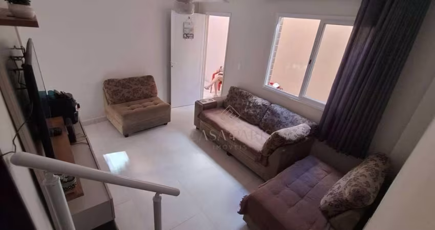 Casa com 2 dormitórios à venda, 59 m² por R$ 405.000,00 - Aviação - Praia Grande/SP